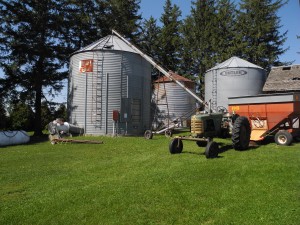 Unloading the first corn of the year into the bins