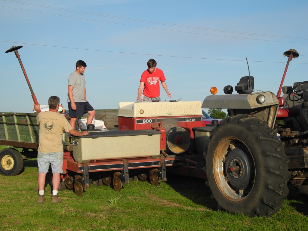 The boys helping Daryl to get the planter ready for tomorrow