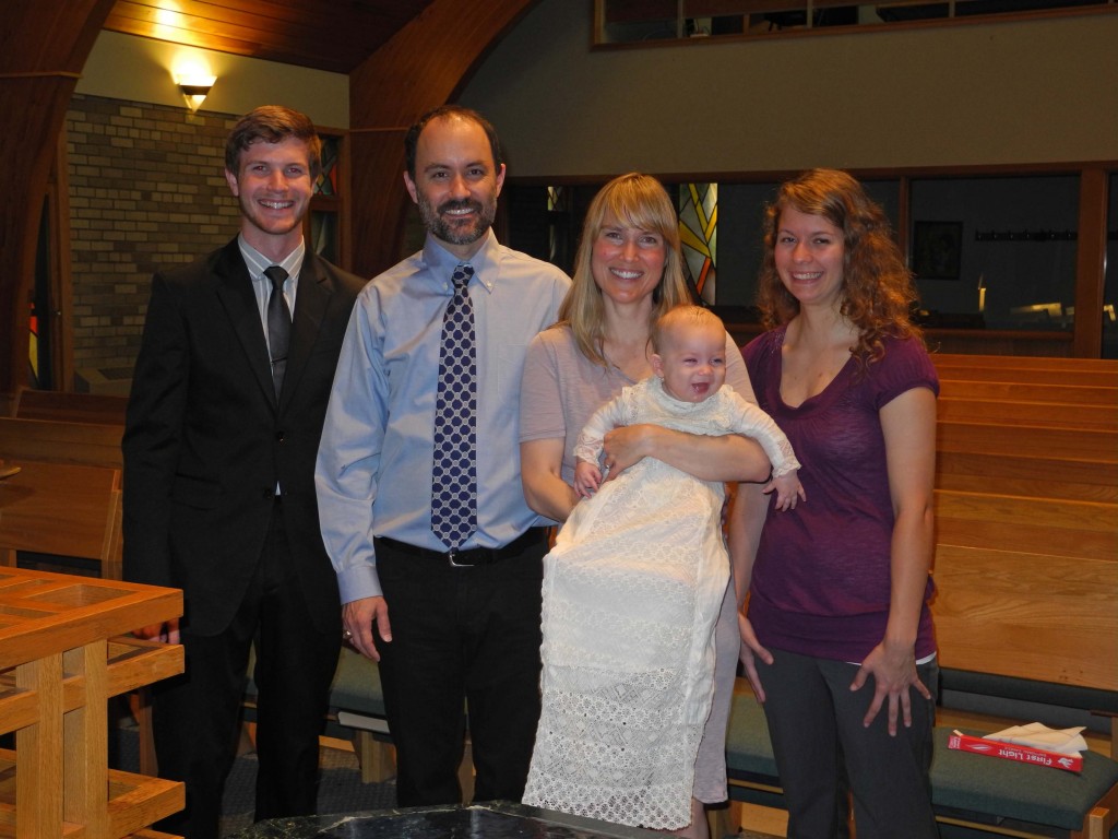 The family along with the Godparents