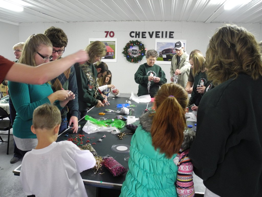 Everyone making their own Christmas ornament for Mom's tree