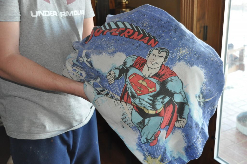 This Superman pillow has seen a good part of the world already