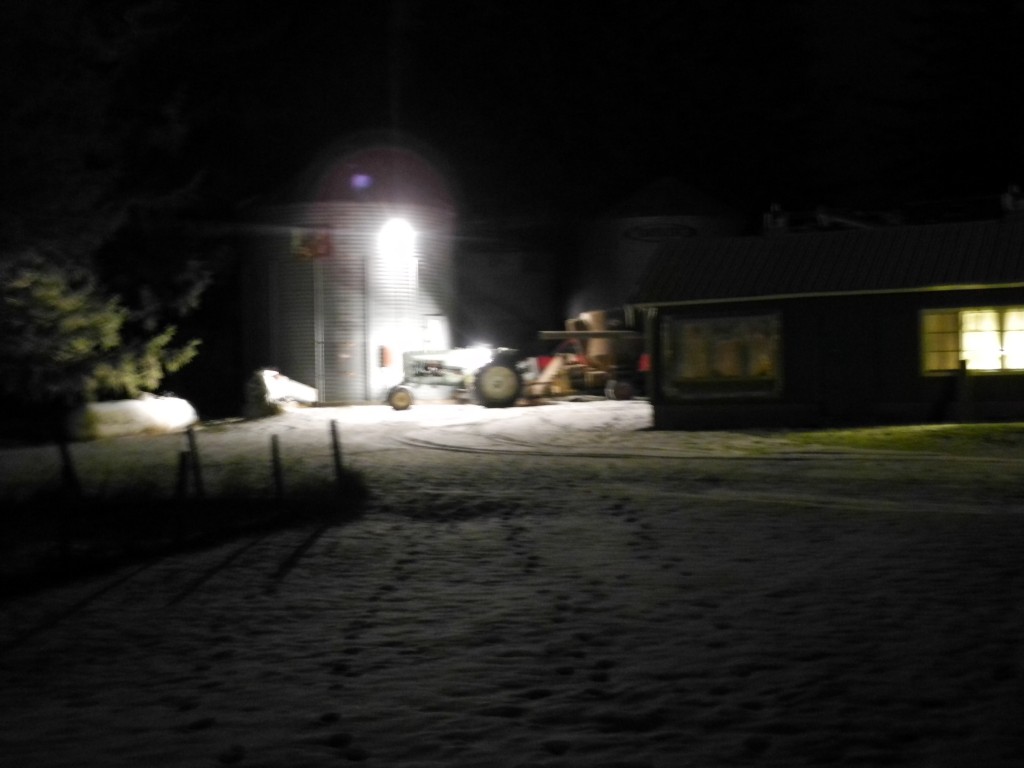 Working late grinding feed for the cows